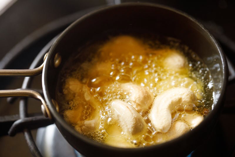 Cashews added to hot ghee.