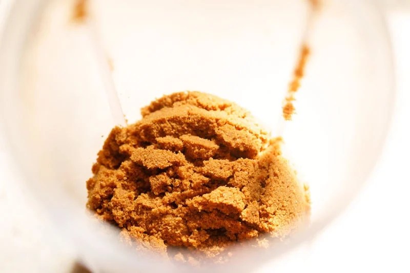 Crushed biscoff cookies in a blender.