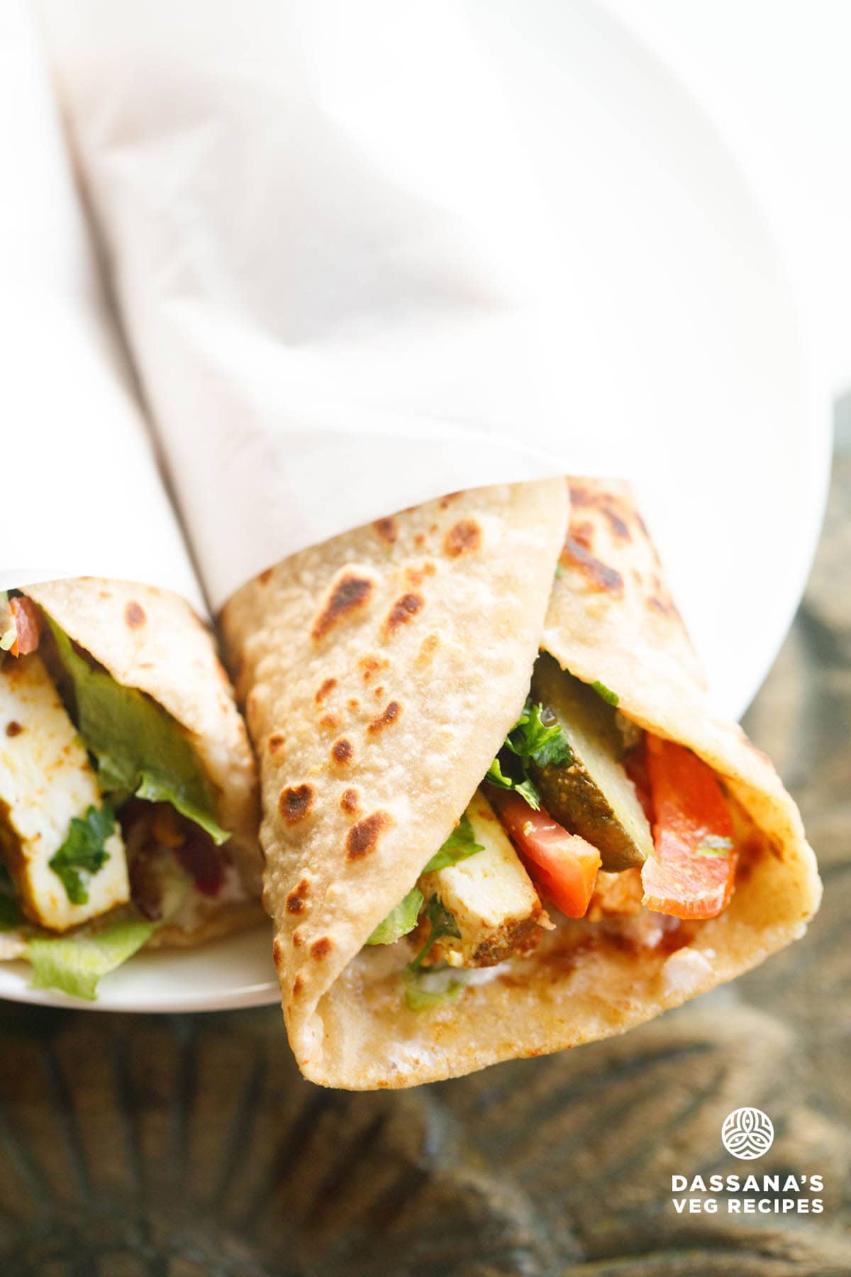 paneer shawarma on a white plate.